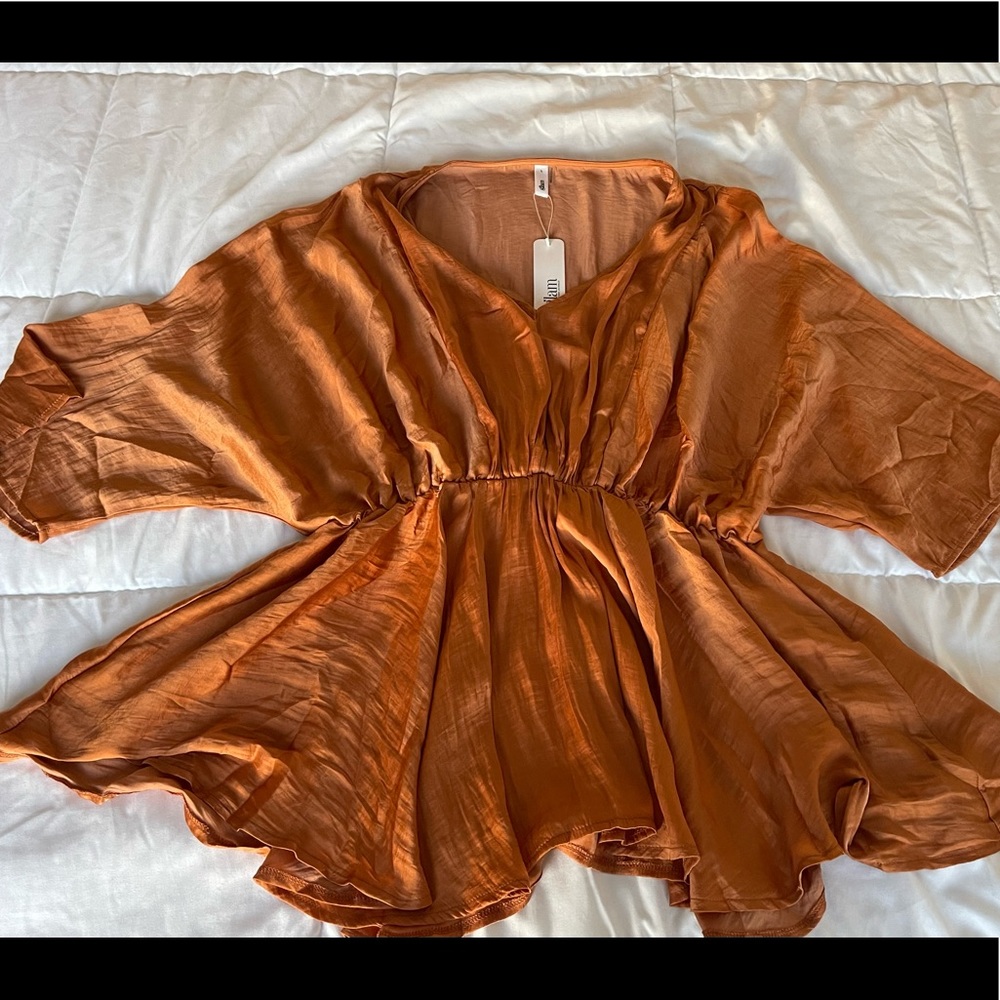 Large top from blushing brunette boutique